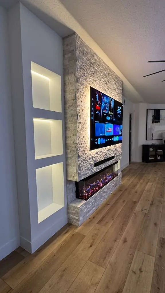 Side view of the stacked stone and recessed niche lighting