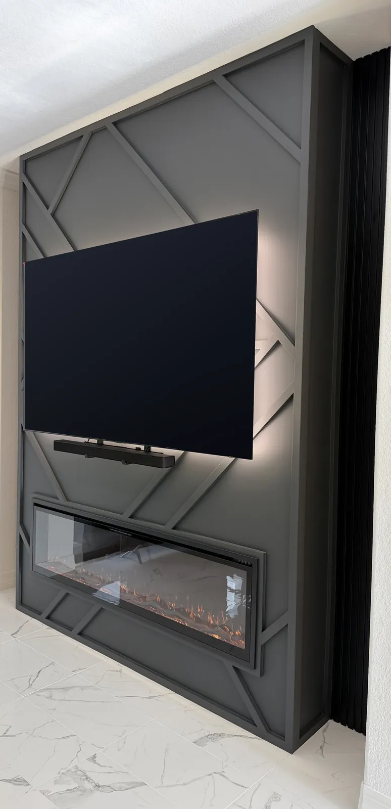 Side view of the graphite panel and the fireplace