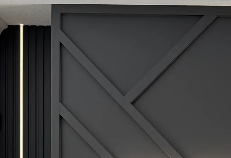 Graphite painted panel with raised diagonal trim