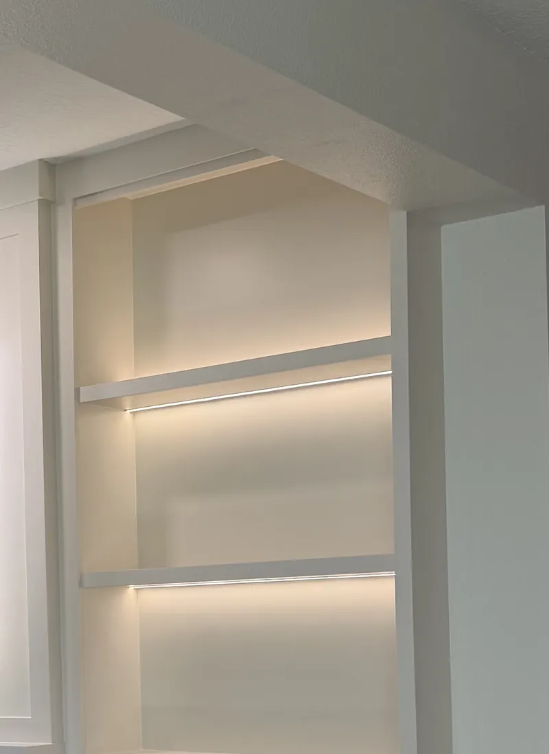 Tall open towers lit from within